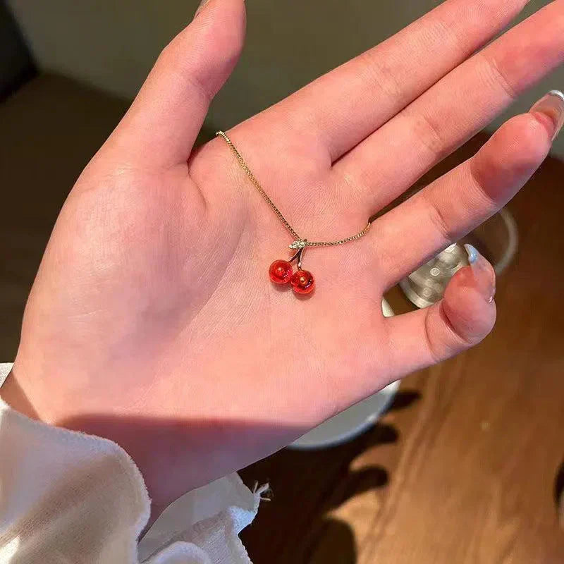 Cléora | Gold necklace with sparkling cherry pendants